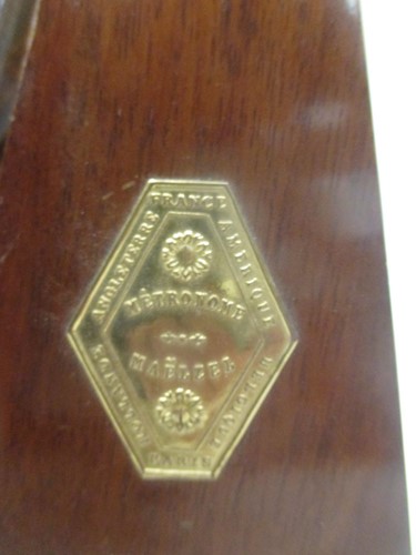 Lot 57 - An aneroid barometer, another barometer, a...