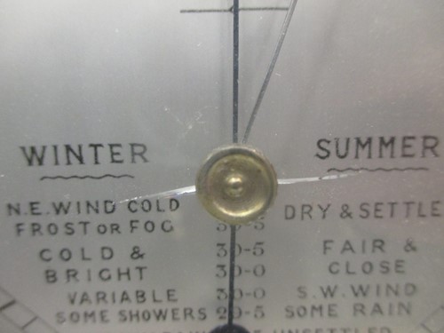 Lot 57 - An aneroid barometer, another barometer, a...