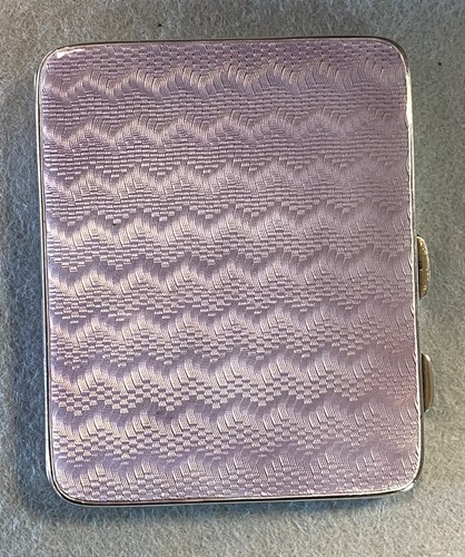 Lot 204 - A silver and enamel pocket cigarette case,...