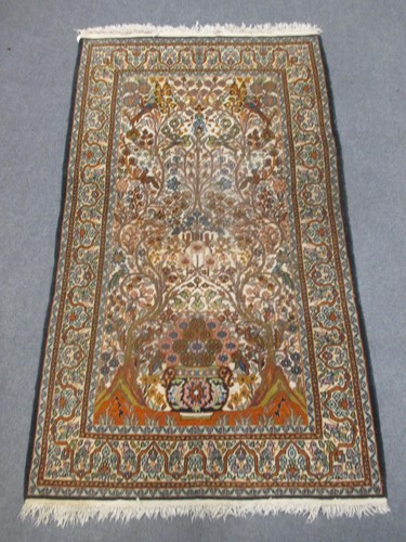 Lot 487 - A attractive Kashan wool and silk rug