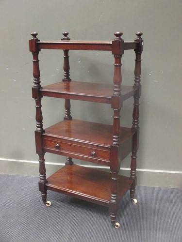 Lot 406 - An early Victorian mahogany four tier whatnot...