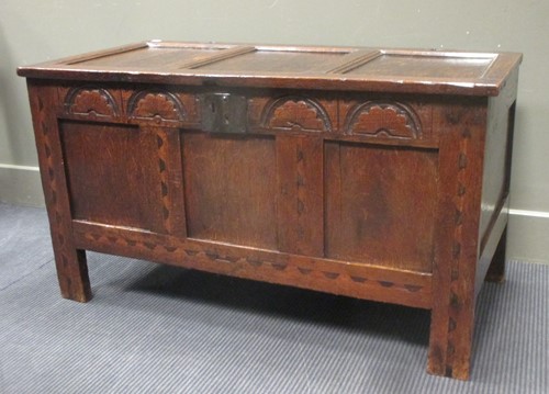 Lot 363 - A 17th century inlaid oak three panel coffer...