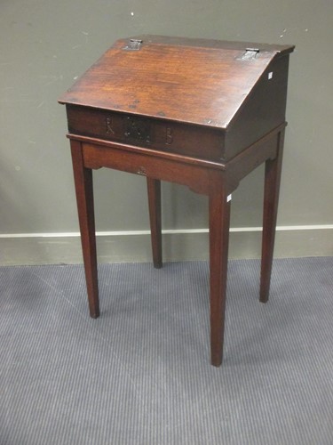 Lot 373 - An 18th century oak bible box on later stand...