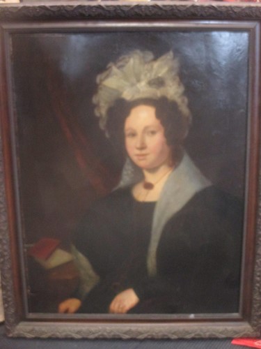 Lot 298 - A 19th century portrait of a lady, oil on...