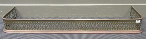 Lot 454 - A pierced brass fender, 125 x 31cm