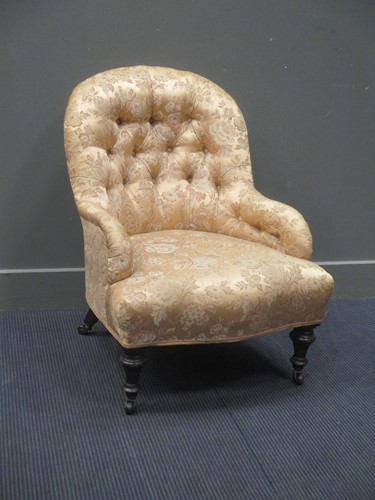 Lot 463 - A Victorian button back chair with yellow...