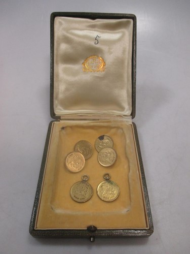 Lot 221 - A pair of gilt coin cufflinks together with...
