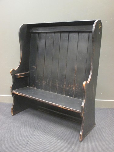 Lot 480 - A 19th century stained pine high back tavern...