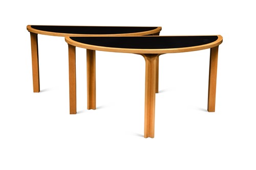 Lot 182 - Rud Thygesen and Johnny Sorensen for Magnus Olesen, a pair of mid-century Elm wood console tables