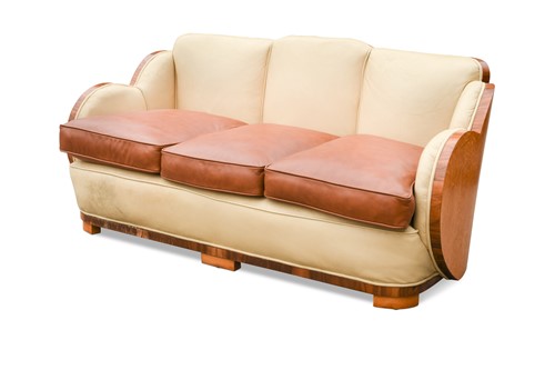 Lot 156 - Harry & Lou Epstein, an Art Deco birds eye maple and leather 'Cloud' sofa