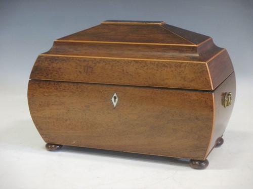Lot 135 - A Regency mahogany sarcophagus shape tea caddy