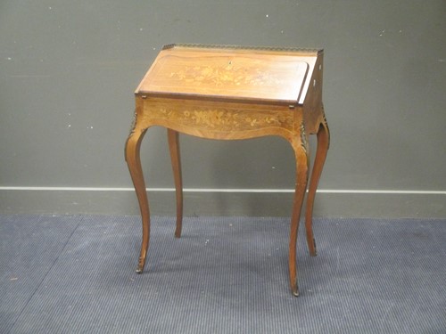 Lot 546 - A Louis XV style bureau de dame on slender...