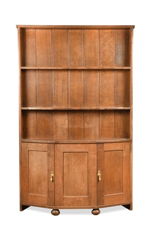 Lot 210 - Attributed to Arthur Romney Green, a Cotswold style oak dresser, circa 1910