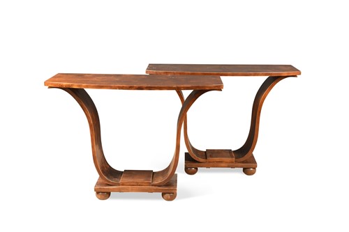 Lot 157 - A pair of Art Deco style stained hardwood console tables