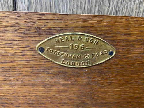 Lot 485 - A Heal's oak single bed frame, circa 1900