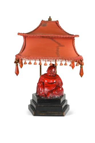 Lot 13 - A rare Royal Doulton flambé model of The Smiling Buddha, circa 1925