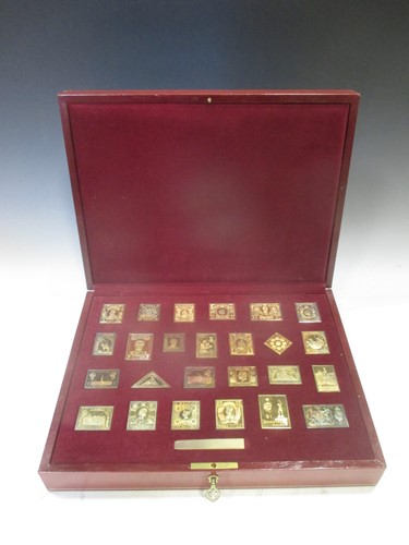 Lot 195 - Two cased sets of silver gilt stamps, one 'The...
