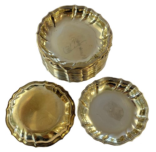 Lot 332 - A set of eighteen 20th century Danish metalwares silver gilt coaster style ashtrays