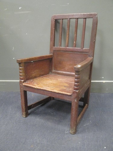Lot 363 - An early oak arm chair with bobbin turned...