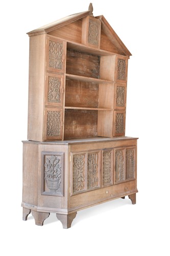Lot 112 - An estate made Arts & Crafts carved oak dresser
