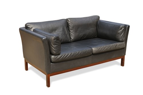 Lot 178 - A Stouby style black leather two-seater sofa