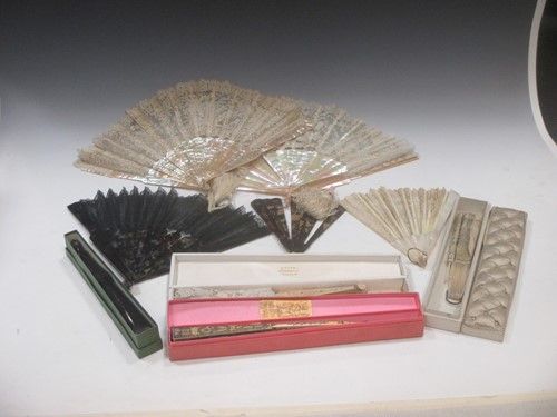 Lot 131 - A collection of fans, including ivory,...