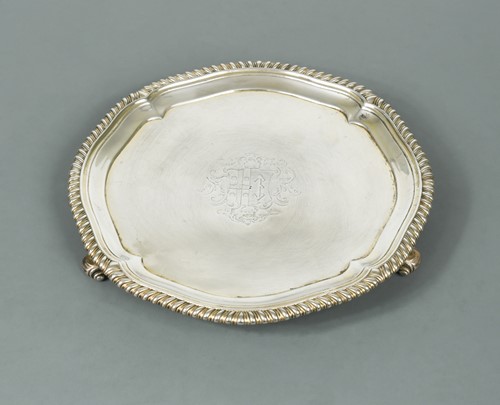 Lot 386 - A George II parcel gilt silver waiter