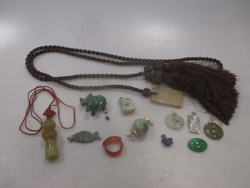 Lot 223 - A collection of jade and other hardstone...