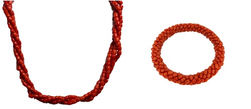 Lot 265 - An early 20th century three strand coral...