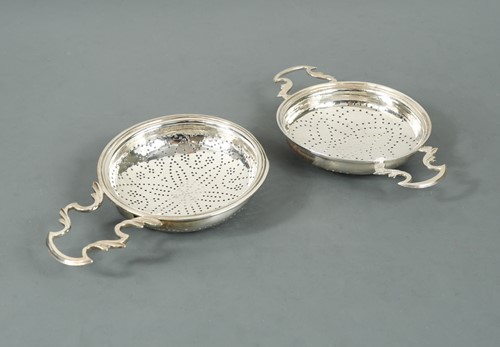 Lot 400 - A George III 18th century silver lemon strainer and another