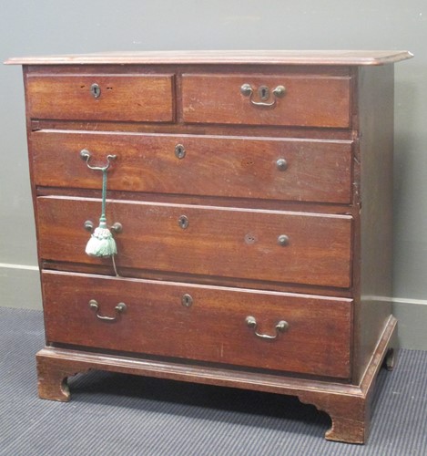 Lot 368 - A George III small mahogany chest of two short...