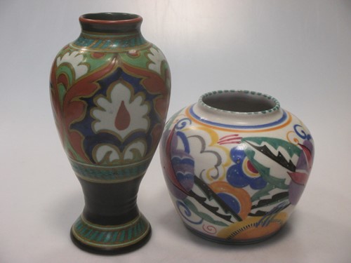 Lot 24 - A Gouda vase, 18cm high & a Poole pottery vase,...