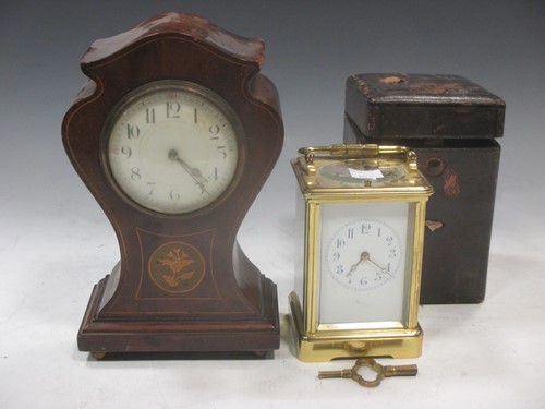 Lot 43 - An Edwardian brass carriage clock with arabic...