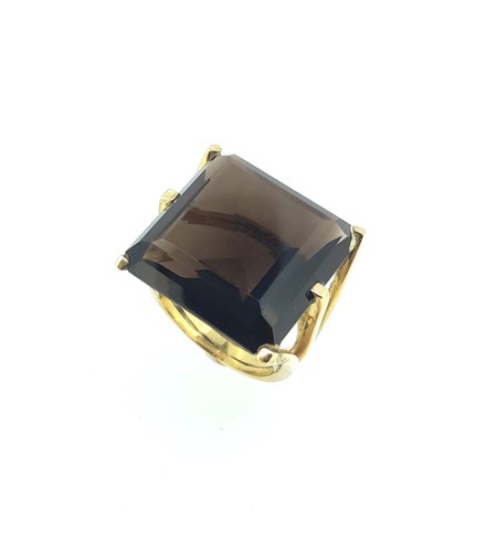 Lot 23 - A large smokey quartz dress ring