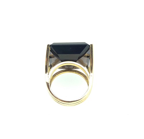 Lot 23 - A large smokey quartz dress ring