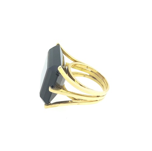 Lot 23 - A large smokey quartz dress ring