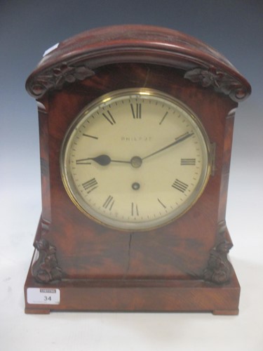 Lot 34 - A 19th Century mahogany mantel timepiece, the...