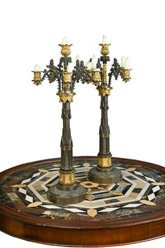 Lot 572 - A pair of bronze and gilt bronze Puginesque six light candelabrum