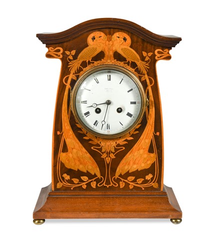 Lot 157 - An Art Nouveau inlaid mahogany mantle clock