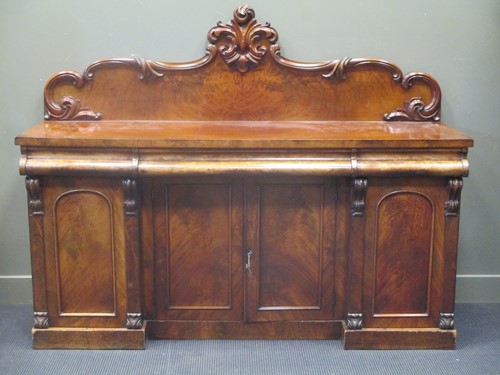 Lot 306 - A Victorian mahogany sideboard with shaped and...