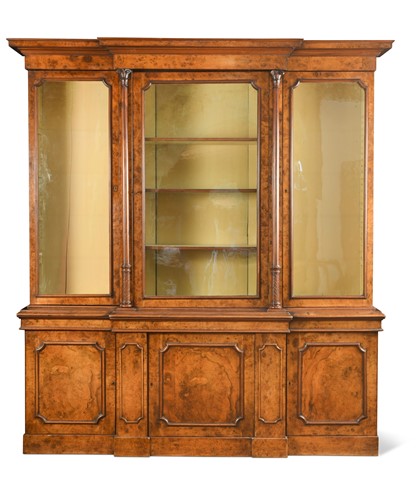 Lot 574 - A Victorian walnut breakfront bookcase