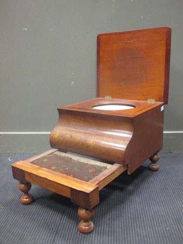Lot 315 - A 19th century mahogany step commode on turned...