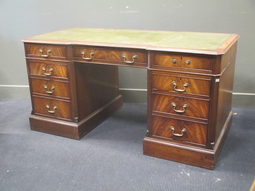 Lot 390 - An Edwardian style mahogany leather topped...