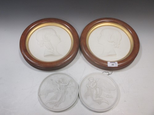 Lot 86 - Two framed plaster portrait roundels together...