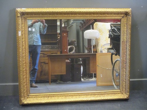 Lot 600 - A large 19th century gilt framed wall mirror,...