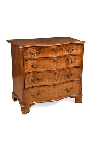 Lot 502 - A George III mahogany serpentine chest