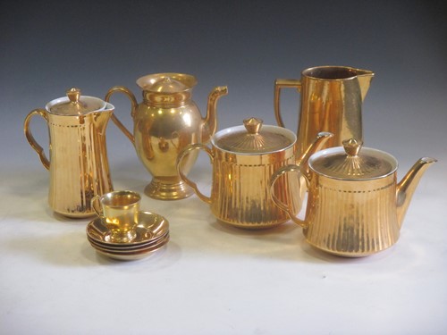 Lot 90 - A Limoges Delvaux gold part tea set and a...