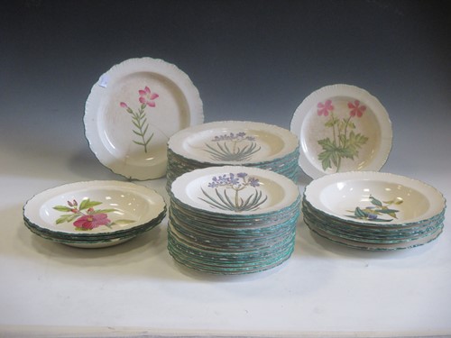 Lot 99 - A part set of Cauldon pottery "Botanical"...
