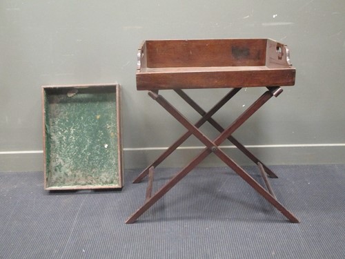 Lot 357 - A 19th century mahogany butlers tray on stand...