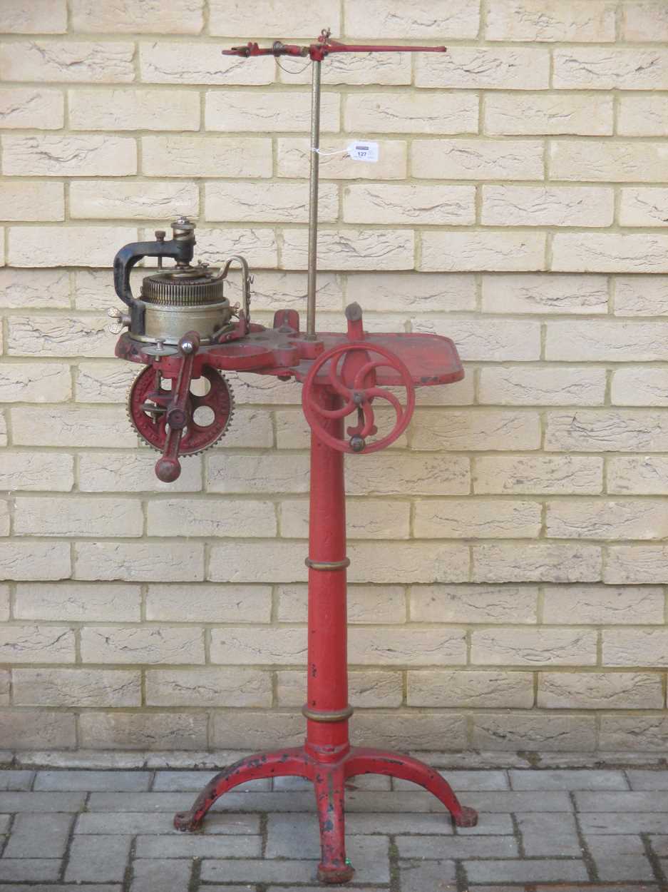 Lot 127 - A Harrison patent sock knitting machine and...